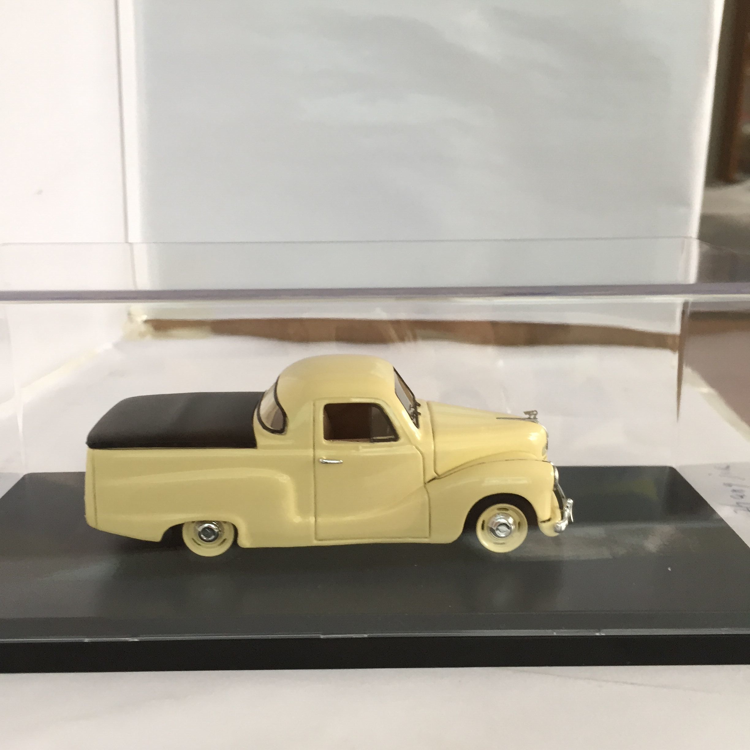 Yellow 1/43 Austin resin collectible car model