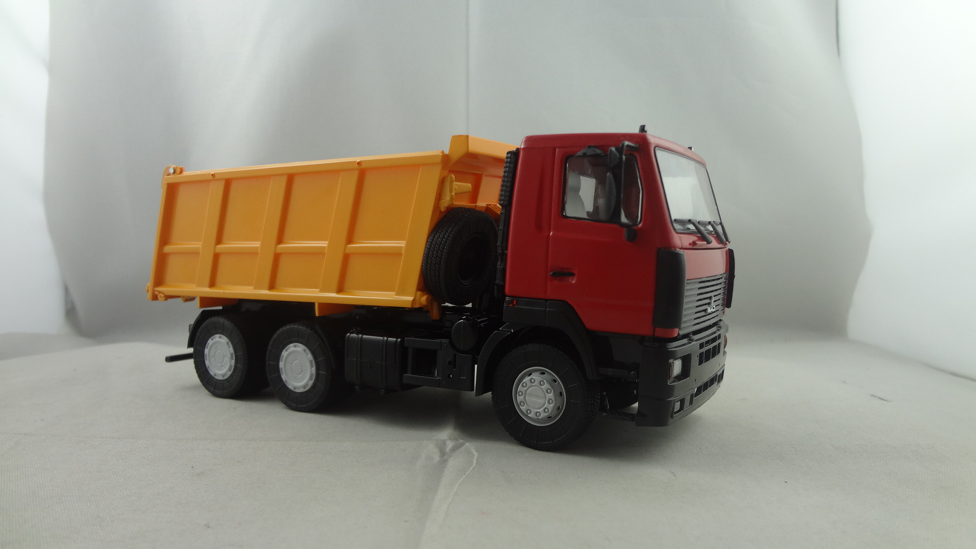 Diecast red function cabine with orange dumper truck model collectible toy