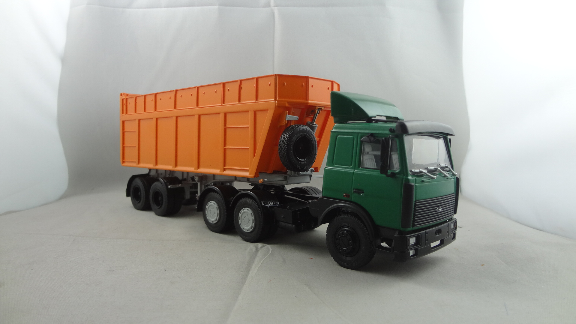 Green cabine with orange flexible dumper collectible truck toys 